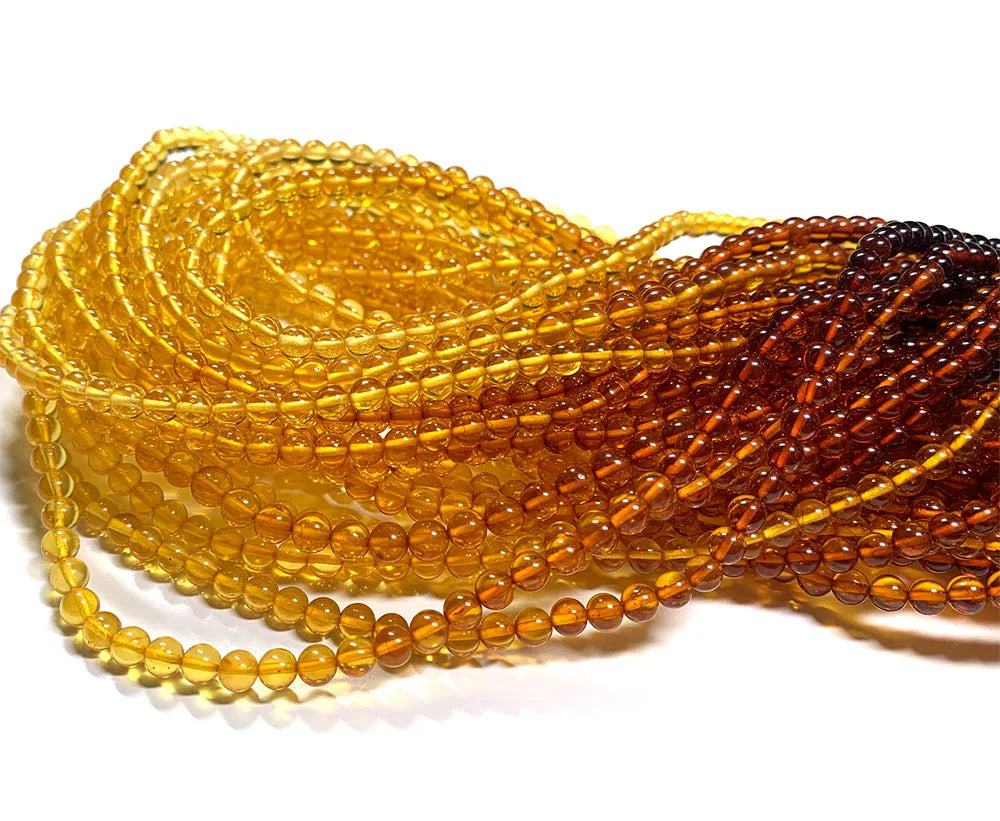 Natural Red/Yellow Amber Gradient Round Bead Strand